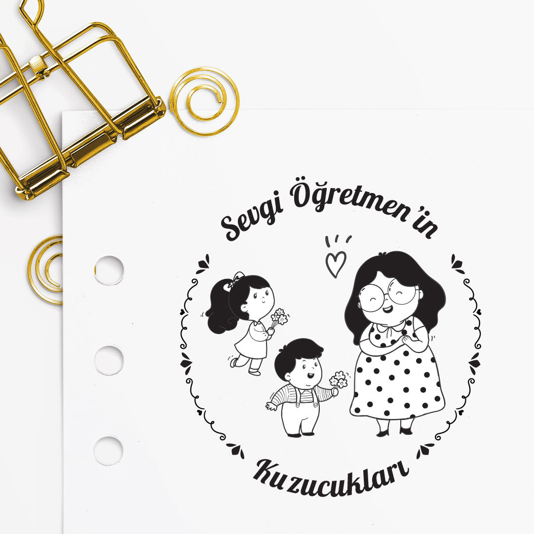 Öğretmenin Kuzucukları mührü tasarım detayı, kuzu figürleri çizimi, isim yazılı
