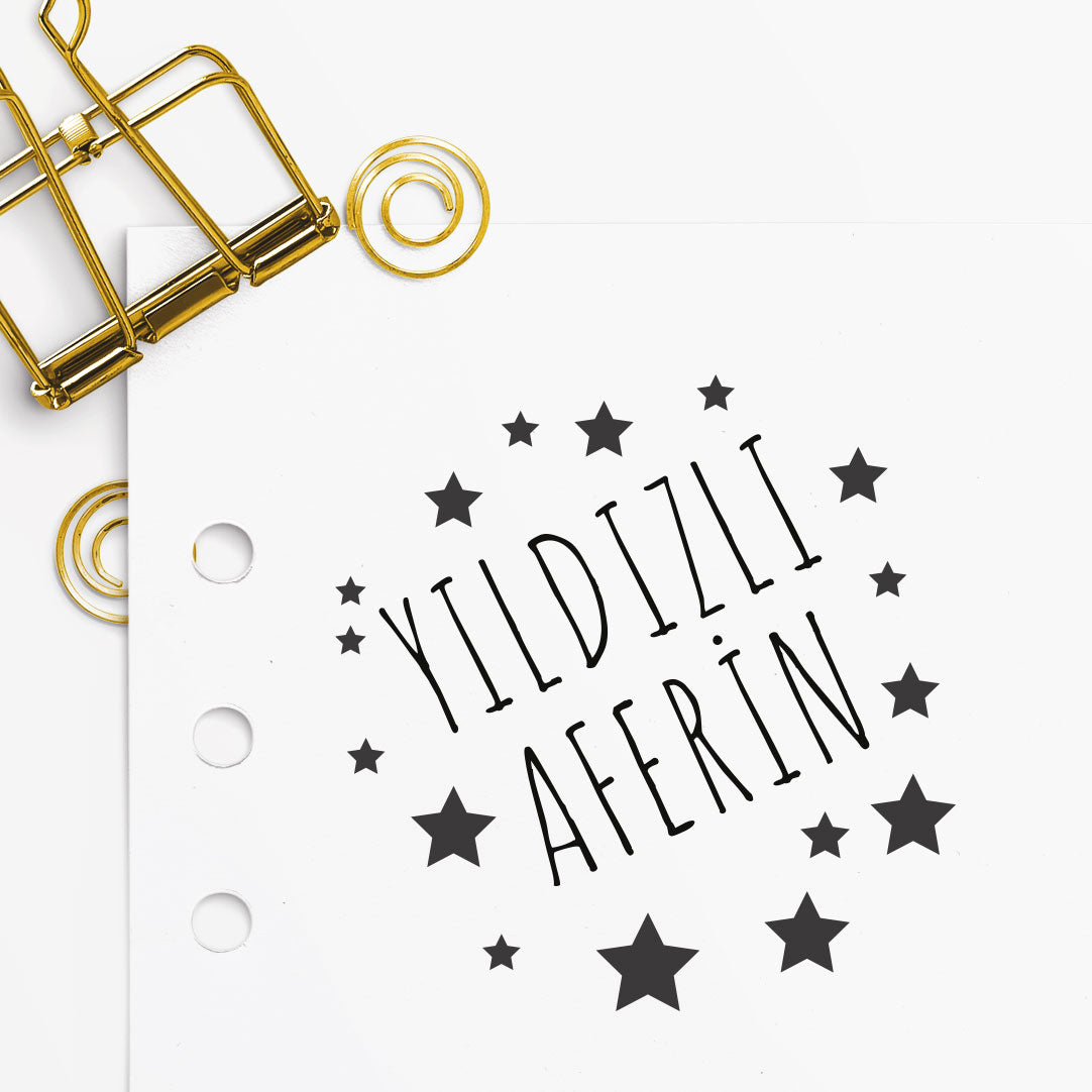 Yıldızlı Aferin Öğretmen mührü tasarım detayı, yıldız desenli 'Aferin' yazısı çizimi