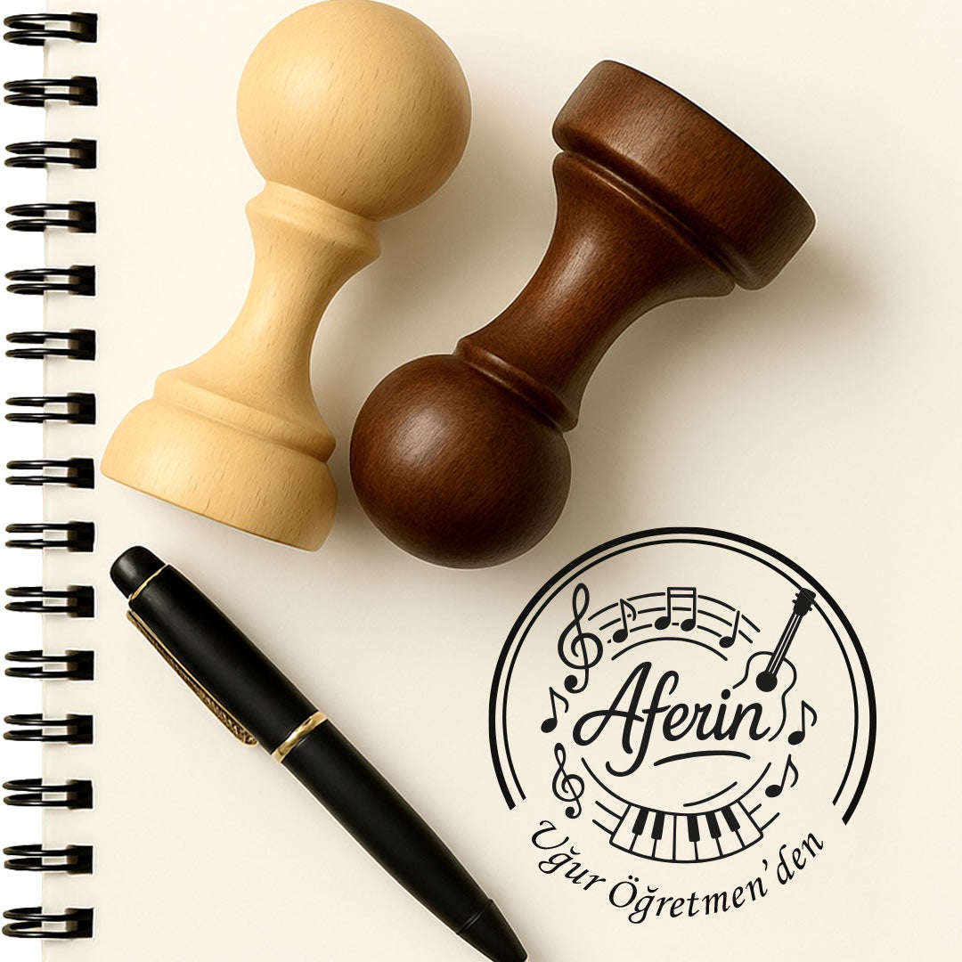 Aferin Müzik Öğretmeni mührü, ahşap saplı mühür ve not defteri üzerine basılmış nota örneği